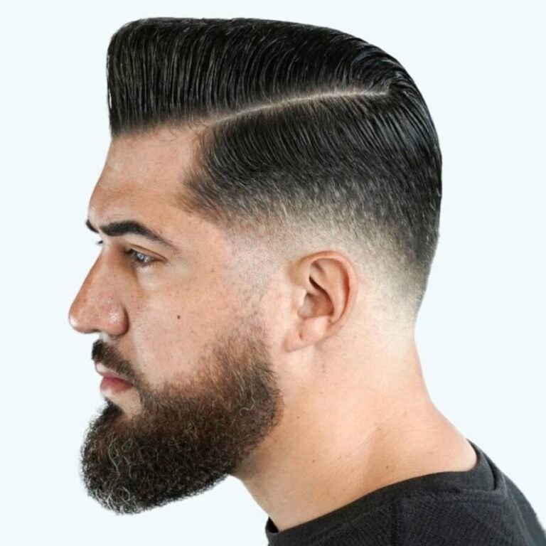 A side-parted haircut illustrating a more groomed top and graduated shorter sides