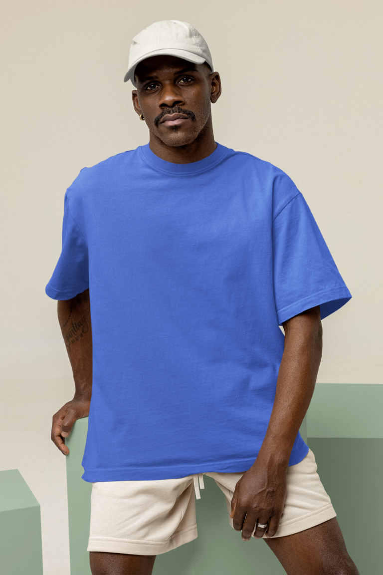 Relaxed royal blue T-shirt worn with light shorts