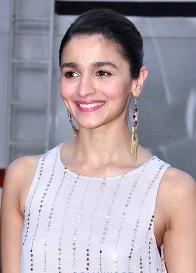 Alia Bhatt — Light sleeveless outfit with vertical detailing