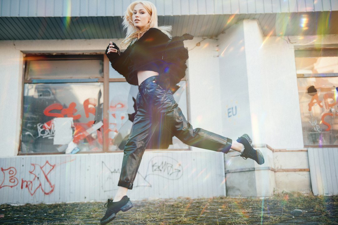 Casual streetwear with jeans and visible light trainers