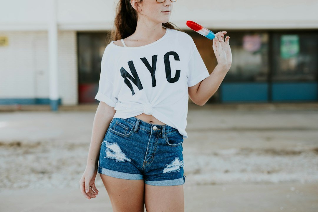 woman oversized t-shirt denim shorts outfit