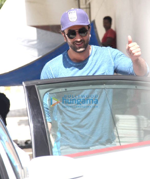 Ranbir Kapoor — Blue T-shirt, cap and sunglasses