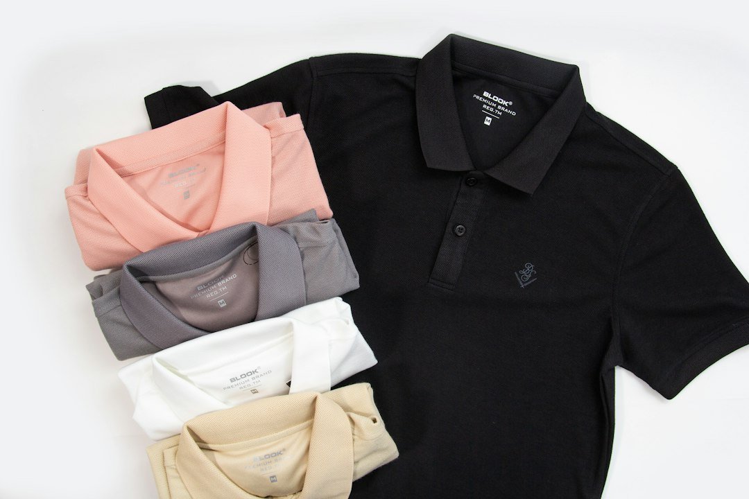 Plain folded tops and a dark polo offering base-layer options