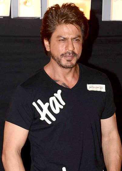 Shah Rukh Khan wearing a black graphic V-neck T-shirt